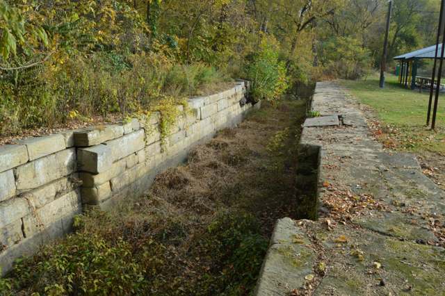 Interior of Ohio and Erie Canal Lock No. 30, looking eastward, in Lock Meadows Park, Lockbourne — the lock that gave the village half its name; photographed 2015