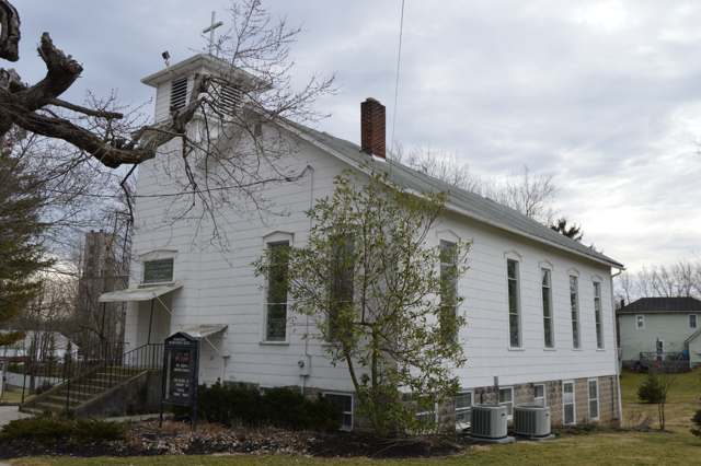 Ostrander Presbyterian Church, 117 W. North Street, descended from the 1834 Little Mill Creek congregation