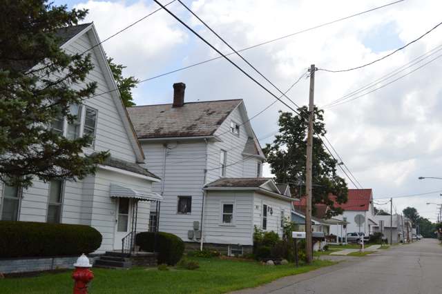 Houses on the north side of Columbus Street at the Walnut Street intersection, Pleasantville