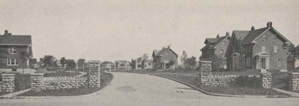 The stone entryway and newly built houses at the intersection of Fifth Avenue and Cambridge Boulevard, marking the entrance to the new Upper Arlington subdivision, 1918.