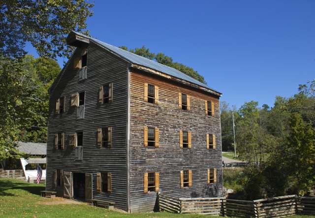 Rock Mill, built into the sandstone ledges above the Hocking River, first raised about 1799 and listed on the National Register of Historic Places in 1990