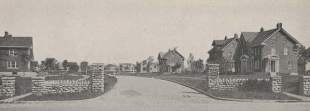 The stone entryway and new houses marking the Upper Arlington development at Fifth Avenue and Cambridge Boulevard, built on former Perry Township farmland.