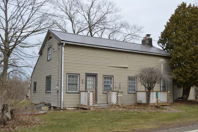 An old wood-frame saltbox house on State Route 656 in East Liberty, Porter Township