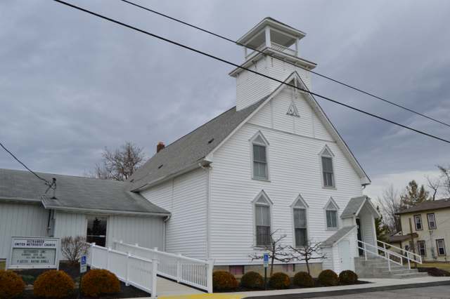Ostrander United Methodist Church, built 1859 and moved to its present site at 166 West North Street in 1874