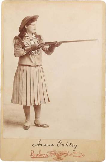 Brisbois cabinet card of Annie Oakley with lithographed signature. 4 1/4” x 6 1/2” overall.