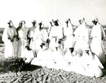 Fourteen NASA astronauts pose for group pictures at Stead Air Force Base in Nevada after a three-day stay in the Nevada