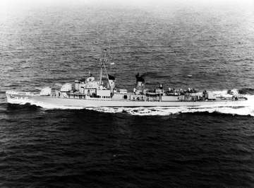 The U.S. Navy destroyer USS Brush (DD-745) underway in the 1960s, after being fitted with Mk 32 anti-submarine torpedo t
