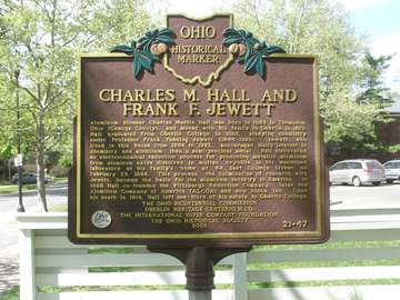 Charles M. Hall and Frank F. Jewett historic marker.