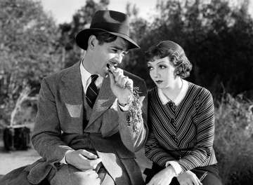 Clark Gable and Claudette Colbert in It Happened One Night (1934) publicity still.