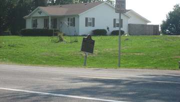 The historical marker for Chief Cornstalk's Village, located on the southwestern corner of U.S. Route 231 and County Roa