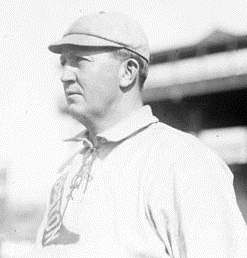 Baseball player "Old" Cy Young, Boston, standing on the field at South Side Park(1908)