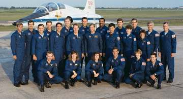 These 18 men and five women make up NASA's 1990 class of astronaut candidates. Kneeling, left to right, are Charles J. P