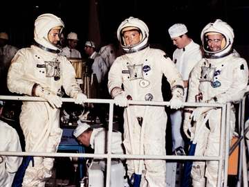 The Apollo 7 crew prepares for mission simulator tests at the North American Aviation plant. Left to right: Donn F. Eise