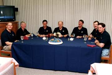 As part of the final STS-82 prelaunch activities, the seven crew members gather for lunch and a photo opportunity in the