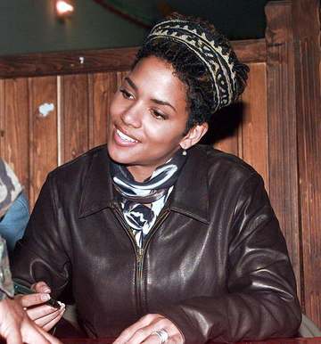Halle Berry signs autographs for US soldiers at Tuzla Main Base, Bosnia-Herzegovina, during Operation JOINT GUARD.