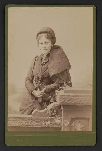 Title: Hallie Quinn Brown, educator and activist, cape draped on shoulder and wearing gloves] / Biddle, Xenia, O Abstrac
