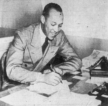 American former track athlete Jesse Owens during his time working for the Ford Motor Company in 1942.