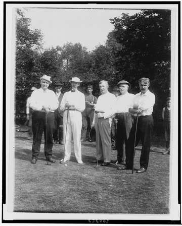 Title: Five men posed, standing with golf clubs, possibly John D. Rockefeller(?), Garwin(?), J.E. McGuire(?), and two ot