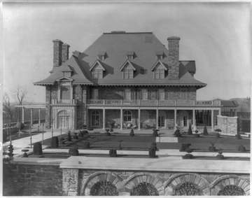 Title: House of John D. Rockefeller - South front &amp; formal garden Abstract/medium: 1 photographic print.