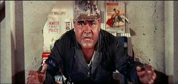 Jonathan Winters crashes through a wall