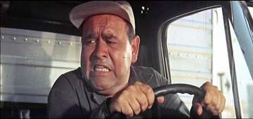 Jonathan Winters as a truck driver