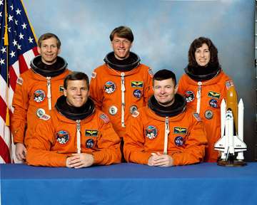 The STS-56 crew portrait includes five astronauts. Seated from the left are Stephen S. Oswald, pilot; and Kenneth D. Cam