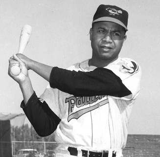 American baseball player Larry Doby in a Baltimore Orioles uniform during spring training in 1958. Doby never played a r
