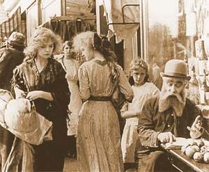 Still from The Musketeers of Pig Alley (1912).