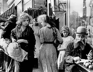 Lillian Gish in the film The Musketeers of Pig Alley (1912).