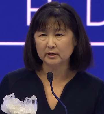 American architect Maya Lin speaking at the 28th Annual Crystal Awards as part of the 2023 World Economic Forum.