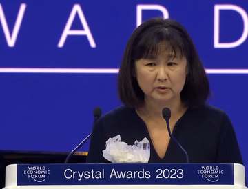 American architect Maya Lin speaking at the 28th Annual Crystal Awards as part of the 2023 World Economic Forum.