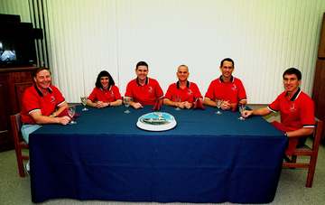 The STS-88 crew gather for the traditional pre-launch breakfast in the Operations and Checkout Building. From left to ri