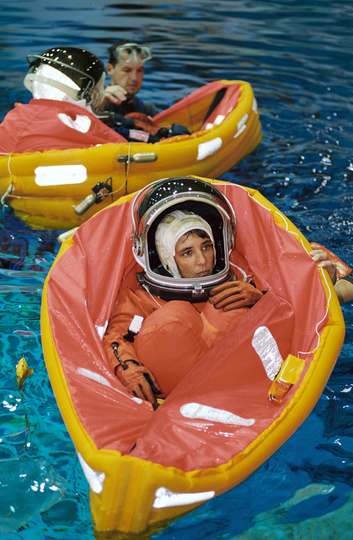 Astronaut Nancy J. Currie, STS-109 mission specialist, floats in a small life raft during an emergency egress training s