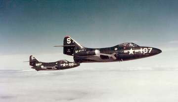 Two U.S. Navy Grumman F9F-2 Panther jets from Fighter Squadron 51 (VF-51) "Screaming Eagles" during a sortie over Korea,
