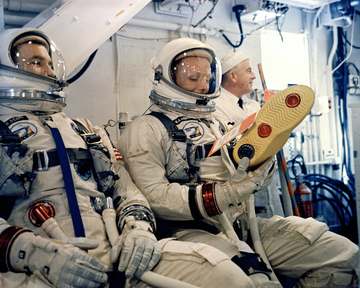 KSC-66C-1875 Astronauts David Scott and Neil Armstrong wait for the order to board their Gemini 8 Spacecraft in the Whit