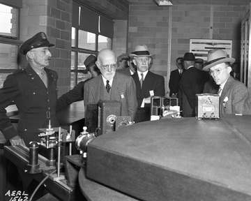 Orville Wright and NACA officials tour the new Aircraft Engine Research Laboratory on May 20, 1943.