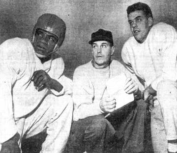 American football players Bill Willis (left), Otto Graham (right) and head coach Paul Brown (center)