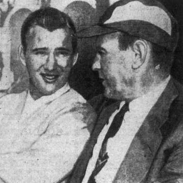 Cleveland Browns quarterback Bobby Garrett (left) and head coach Paul Brown (right)