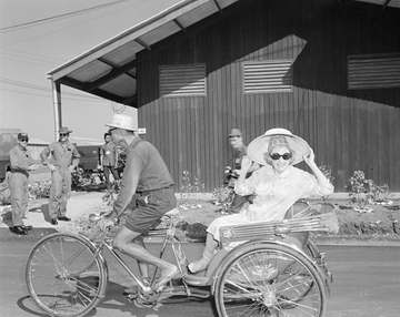 Comedian Phyllis Diller arrives at Korat Air Base, Thailand, with the Bob Hope Xmas show, 1966
