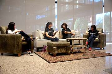 Natalie Diaz, Sandra Cisneros, Rita Dove and Joy Harjo speaking with attendees at an event titled "Legacies: A Conversat