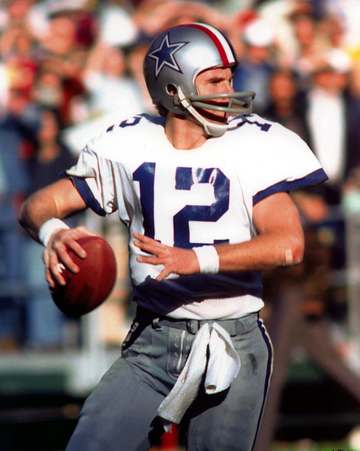 Former Dallas Cowboys' QB Roger Staubach, wearing the helmet with the red-white-blue stripes in commemoration of the US'
