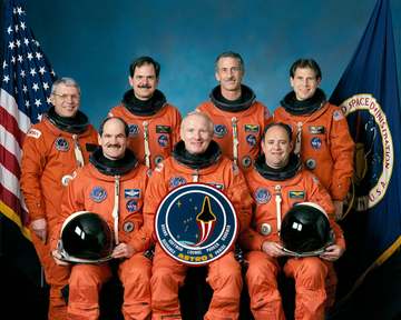 The five astronauts and two payload specialists assigned to NASA's STS-35 mission, scheduled aboard Columbia, Orbiter Ve