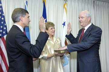 Michael W. Wynne (right) takes the oath of office as the 21st Secretary of the Air Force during a ceremony in the Pentag