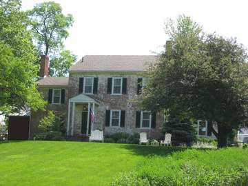 Front of the farmhouse at the Kenton-Hunt Farm, located at 4690 Urbana Road (State Route 72) north of Springfield in Moo