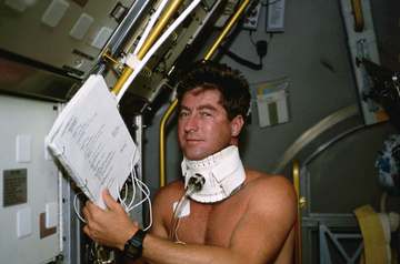 Working in the shirt-sleeve research environment of the Spacelab Deutsche 2 (SL-D2) science module, STS-55 Pilot Terence