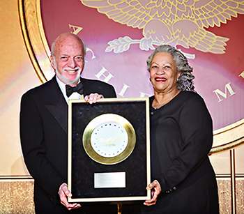 Broadway director Harold Prince receives the Golden Plate award from Nobel laureate Toni Morrison at the American Academ