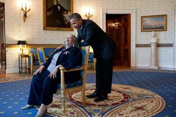 President Barack Obama talks with Presidential Medal of Freedom recipient Toni Morrison in the Blue Room of the White Ho