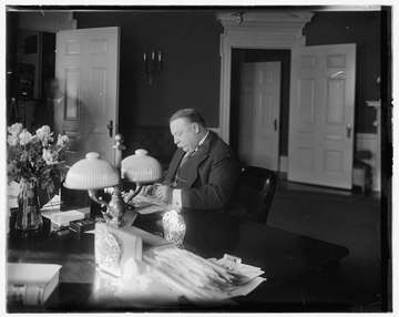 Title: Taft at desk Abstract/medium: 1 transparency : glass ; 8 x 10 in. or smaller