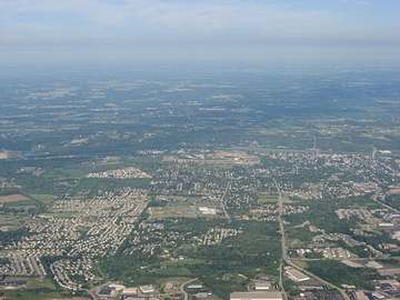 Aerial view of Miamisburg, Ohio with the Great Miami River visible, source of the city's buried-valley aquifer wells