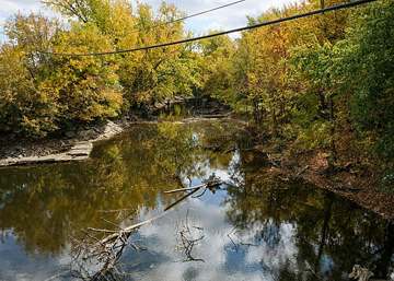 Flatrock Creek viewed from East Perry Street (US 127) in Paulding, Ohio, the stream that feeds Paulding Reservoir